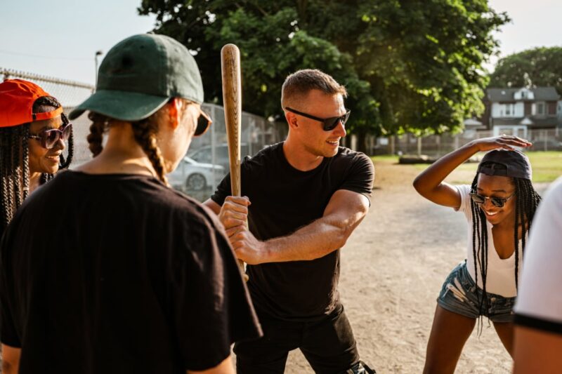 People playing softball