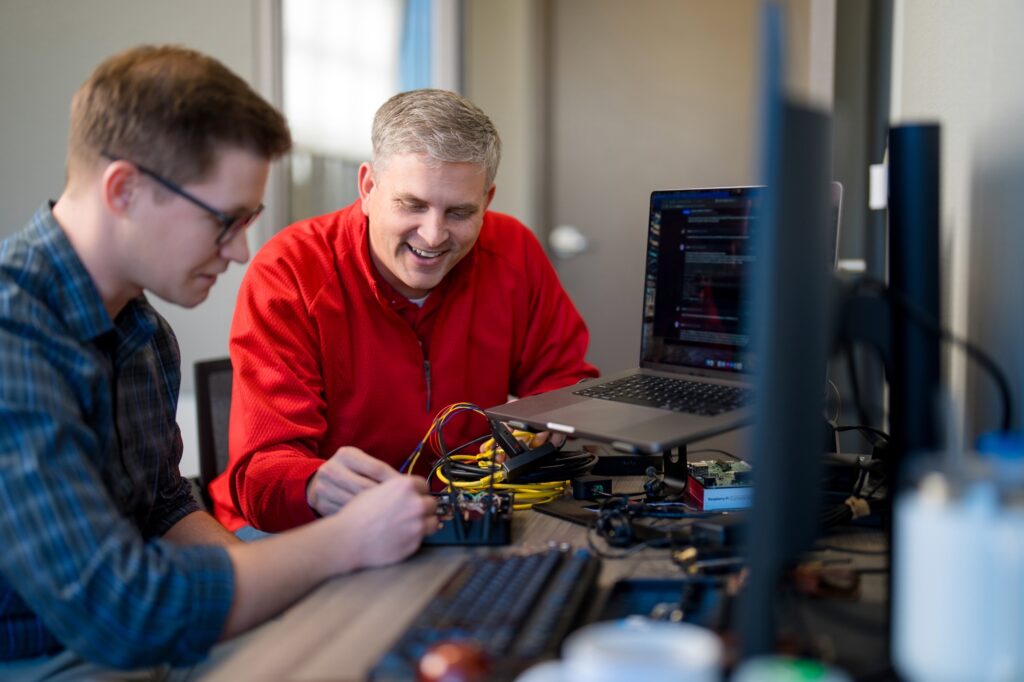 Staff working on a computer